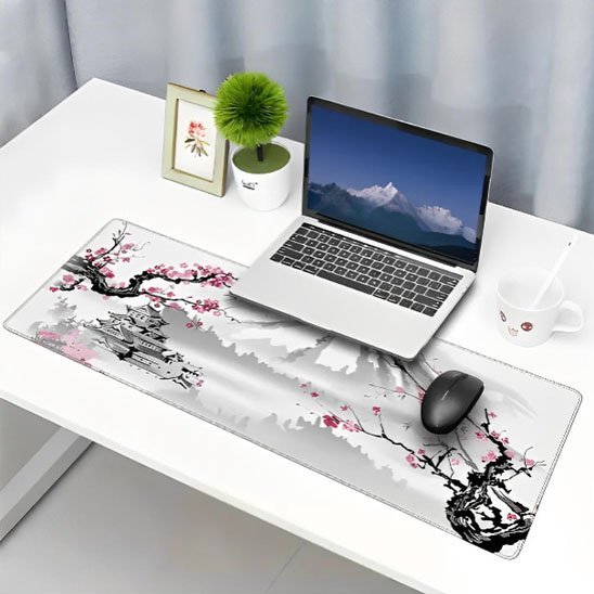 tapis de souris xxl avec plante verte cadre photo tasse souris et pc portable