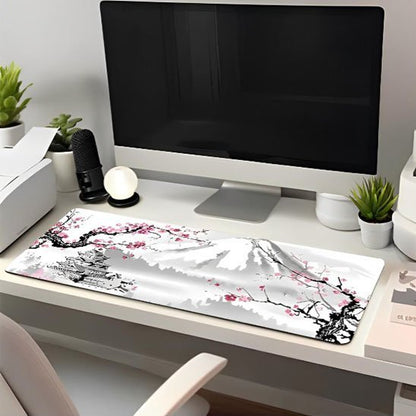 tapis de souris xxl sur bureau blanc avec plante et materiel de bureau